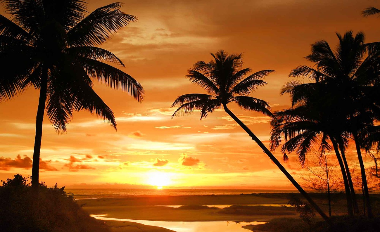 gambar sunset di pinggir pantai